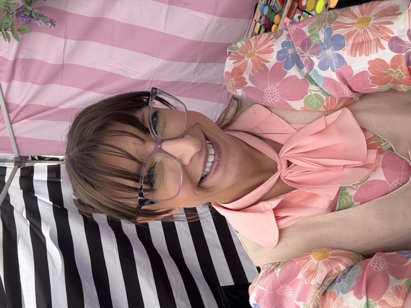 Candace at her face painting booth