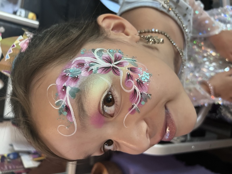 Floral Eye Wreath — tropical flowers framing the eye